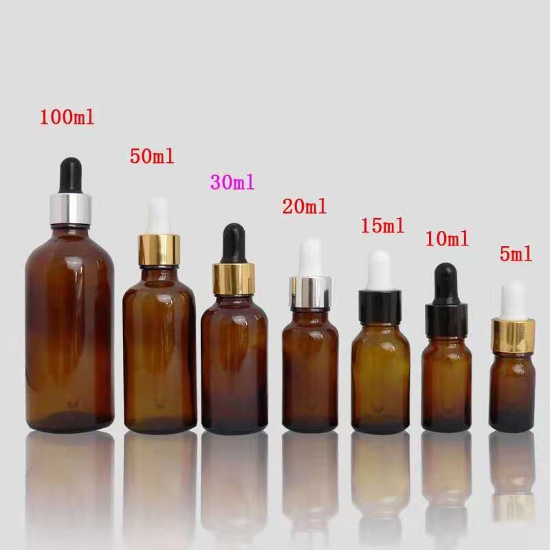 Amber glass bottle with alumite lid for cosmetic packaging 