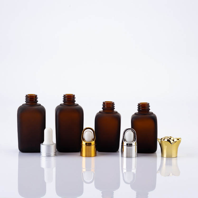 Square Estee Lauder Amber glass droppper bottle 